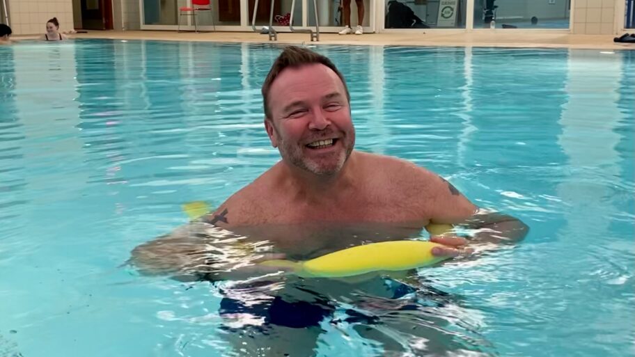 Kenn swimming and smiling at one of the WeSwim sessions.